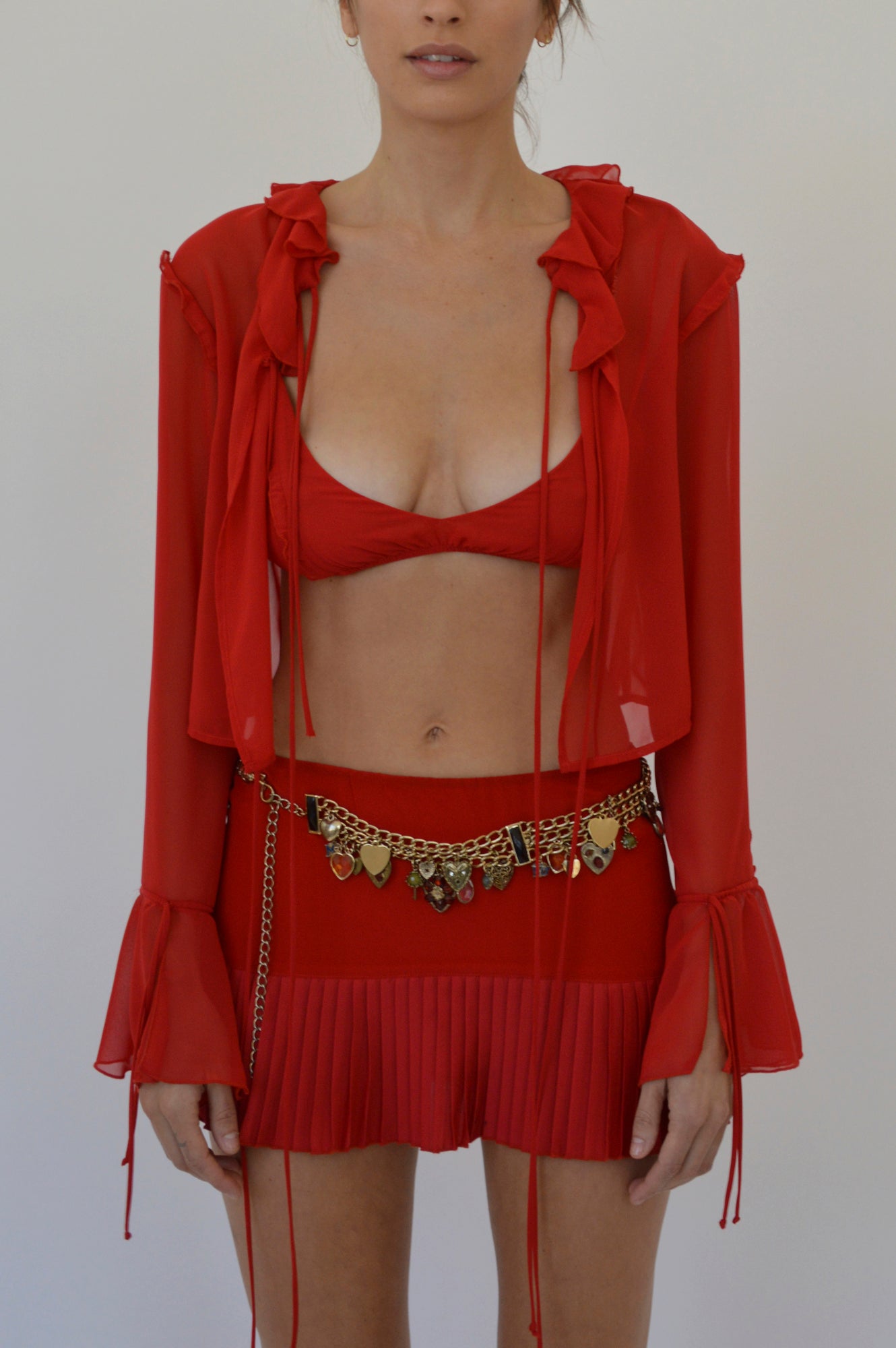 MATILDA LOW RISE PLEATED MINI SKIRT - SCARLET - FAIT PAR FOUTCH