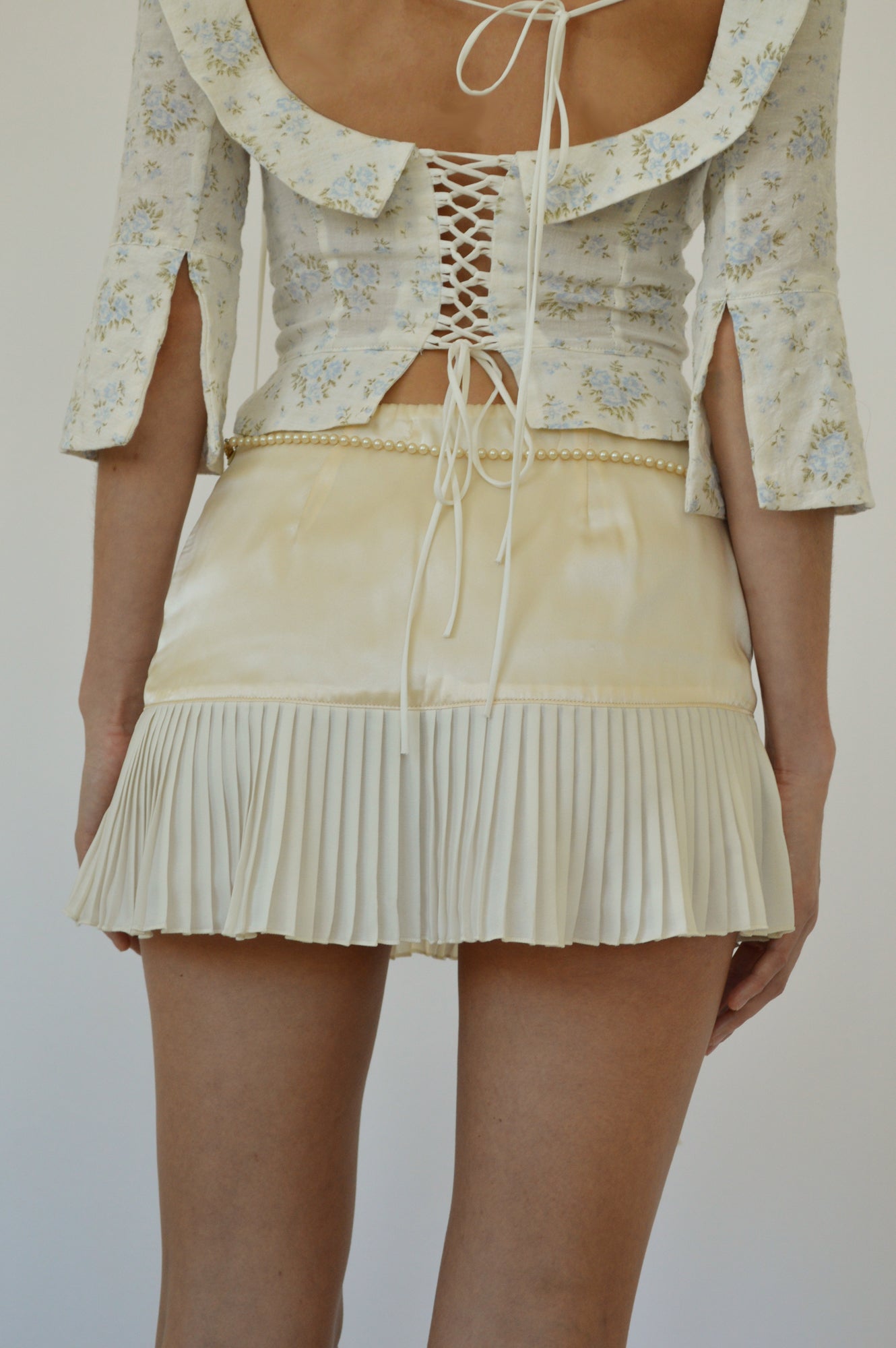 MATILDA LOW RISE PLEATED MINI SKIRT - IVORY - FAIT PAR FOUTCH
